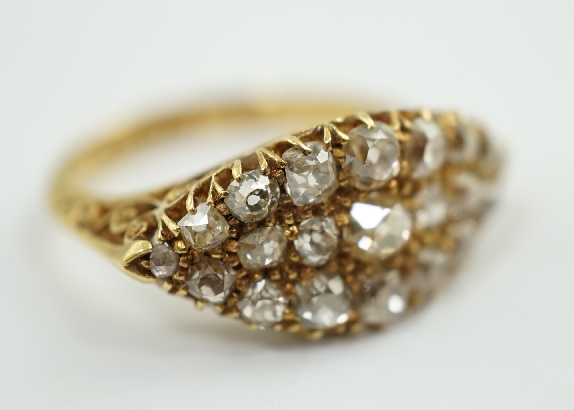 A George V 18ct gold and old mine cut diamond cluster set dress ring